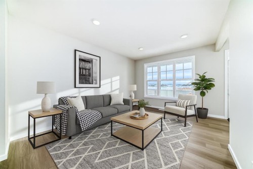 828 Sora Boulevard Se, Calgary, AB - Indoor Photo Showing Living Room
