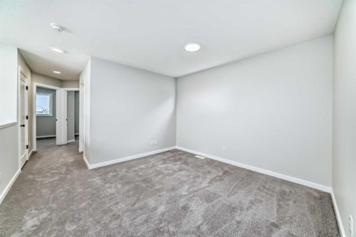 828 Sora Boulevard Se, Calgary, AB - Indoor Photo Showing Other Room