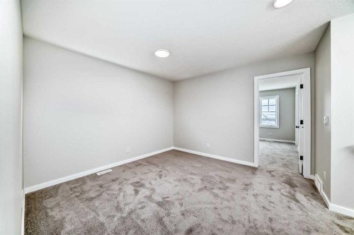 828 Sora Boulevard Se, Calgary, AB - Indoor Photo Showing Other Room