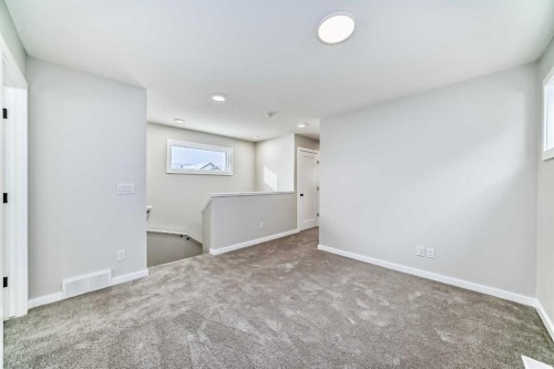 828 Sora Boulevard Se, Calgary, AB - Indoor Photo Showing Other Room