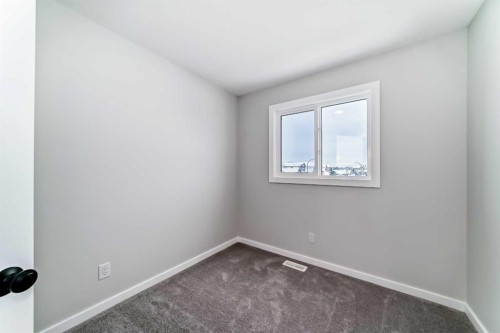828 Sora Boulevard Se, Calgary, AB - Indoor Photo Showing Other Room