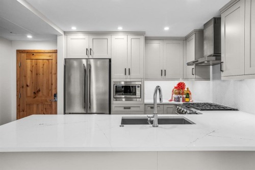 108-1606 Spring Creek Gate, Canmore, AB - Indoor Photo Showing Kitchen With Upgraded Kitchen