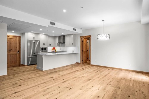 108-1606 Spring Creek Gate, Canmore, AB - Indoor Photo Showing Kitchen