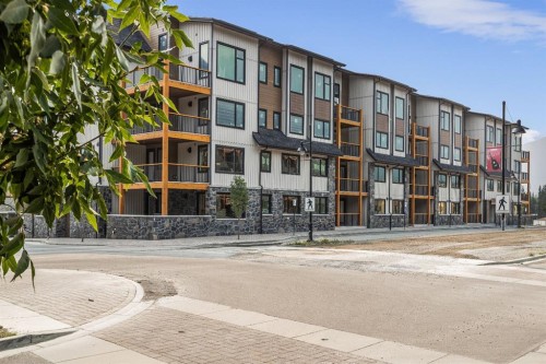 108-1606 Spring Creek Gate, Canmore, AB - Outdoor With Facade