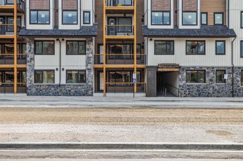 108-1606 Spring Creek Gate, Canmore, AB - Outdoor With Facade