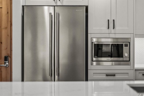 108-1606 Spring Creek Gate, Canmore, AB - Indoor Photo Showing Kitchen