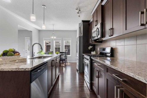 51 Walgrove Terrace Se, Calgary, AB - Indoor Photo Showing Kitchen With Upgraded Kitchen