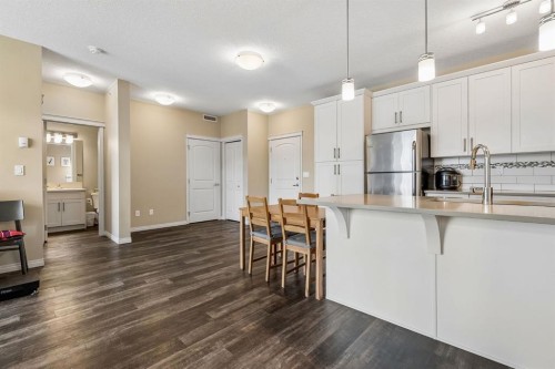 1403-450 Sage Valley Drive Nw, Calgary, AB - Indoor Photo Showing Kitchen With Upgraded Kitchen
