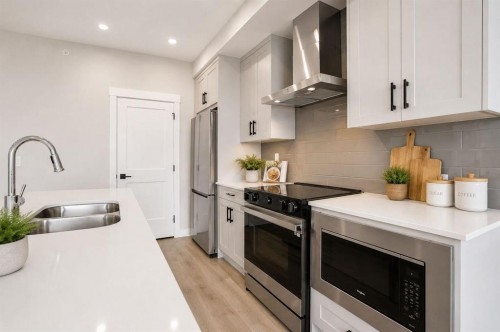 6412-200 Seton Circle Se, Calgary, AB - Indoor Photo Showing Kitchen With Double Sink With Upgraded Kitchen