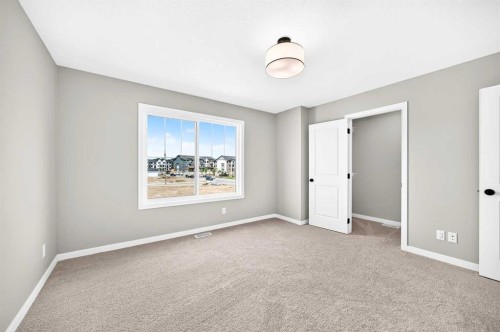 277 Heirloom Way Se, Calgary, AB - Indoor Photo Showing Other Room
