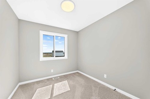 277 Heirloom Way Se, Calgary, AB - Indoor Photo Showing Other Room