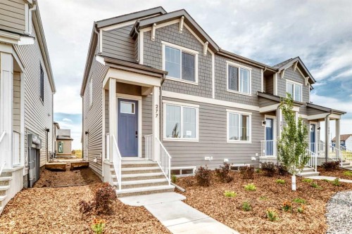 277 Heirloom Way Se, Calgary, AB - Outdoor With Facade