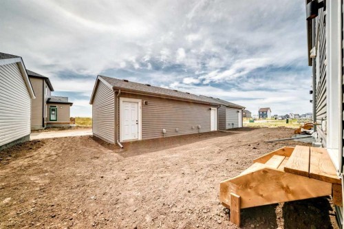 277 Heirloom Way Se, Calgary, AB - Outdoor With Exterior