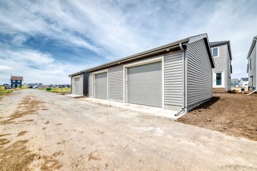 277 Heirloom Way Se, Calgary, AB - Outdoor With Exterior