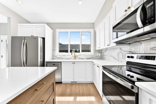 277 Heirloom Way Se, Calgary, AB - Indoor Photo Showing Kitchen With Upgraded Kitchen