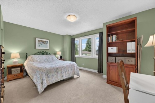2511 Exshaw Road Nw, Calgary, AB - Indoor Photo Showing Bedroom