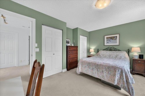 2511 Exshaw Road Nw, Calgary, AB - Indoor Photo Showing Bedroom
