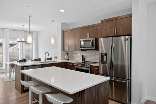 226 148 Avenue Nw, Calgary, AB - Indoor Photo Showing Kitchen With Stainless Steel Kitchen With Upgraded Kitchen