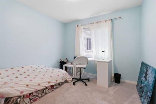 73 Morningside Circle, Airdrie, AB - Indoor Photo Showing Bedroom