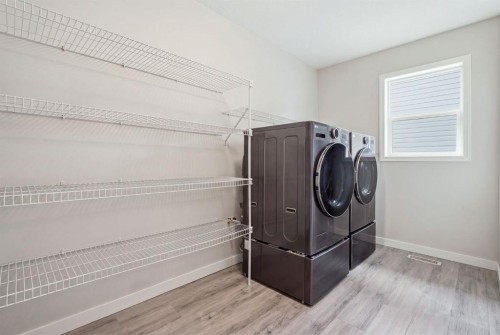 73 Morningside Circle, Airdrie, AB - Indoor Photo Showing Laundry Room