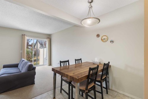 17 Panatella Villas Nw, Calgary, AB - Indoor Photo Showing Dining Room
