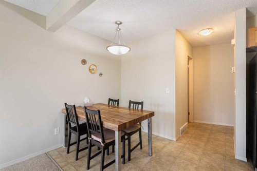17 Panatella Villas Nw, Calgary, AB - Indoor Photo Showing Dining Room