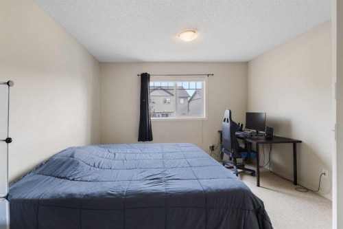 17 Panatella Villas Nw, Calgary, AB - Indoor Photo Showing Bedroom