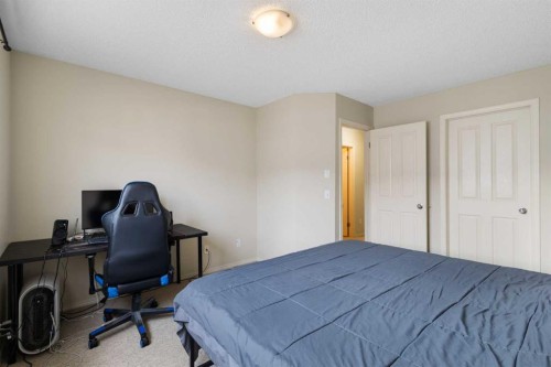 17 Panatella Villas Nw, Calgary, AB - Indoor Photo Showing Bedroom
