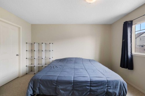 17 Panatella Villas Nw, Calgary, AB - Indoor Photo Showing Bedroom