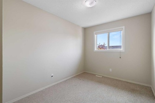 17 Panatella Villas Nw, Calgary, AB - Indoor Photo Showing Other Room