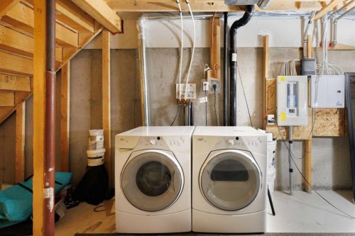 17 Panatella Villas Nw, Calgary, AB - Indoor Photo Showing Laundry Room