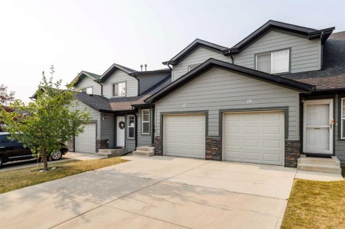 17 Panatella Villas Nw, Calgary, AB - Outdoor With Facade