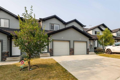 17 Panatella Villas Nw, Calgary, AB - Outdoor With Facade