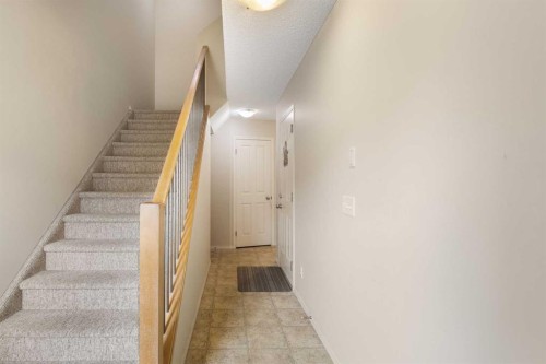 17 Panatella Villas Nw, Calgary, AB - Indoor Photo Showing Other Room