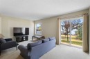 17 Panatella Villas Nw, Calgary, AB  - Indoor Photo Showing Living Room 