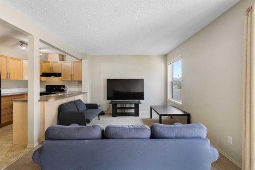 17 Panatella Villas Nw, Calgary, AB - Indoor Photo Showing Living Room