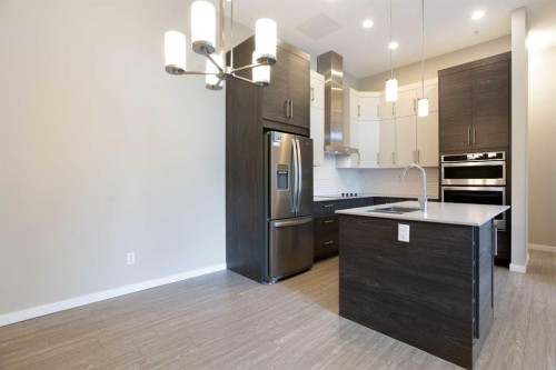124-Mahogany Centre Centre Se, Calgary, AB - Indoor Photo Showing Kitchen With Double Sink With Upgraded Kitchen
