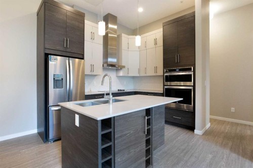 124-Mahogany Centre Centre Se, Calgary, AB - Indoor Photo Showing Kitchen With Double Sink With Upgraded Kitchen