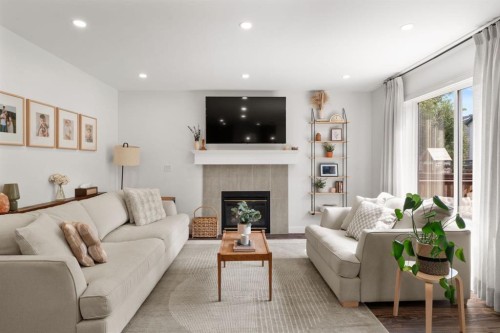3725 Douglas Ridge Way Se, Calgary, AB - Indoor Photo Showing Living Room With Fireplace