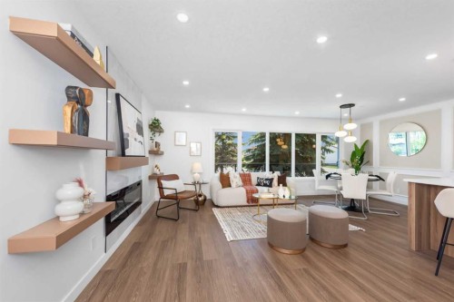 820 Archwood Road Se, Calgary, AB - Indoor Photo Showing Living Room With Fireplace
