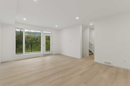 84-1453 Na'A Drive Sw, Calgary, AB - Indoor Photo Showing Other Room
