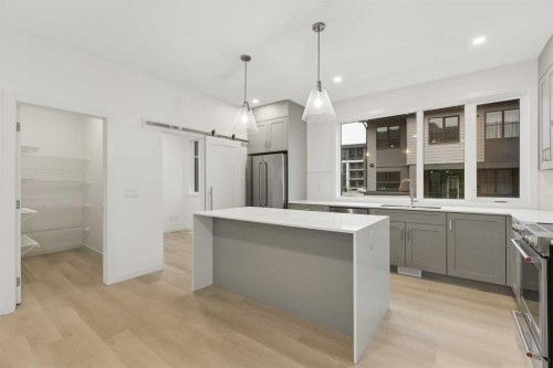 84-1453 Na'A Drive Sw, Calgary, AB - Indoor Photo Showing Kitchen With Upgraded Kitchen