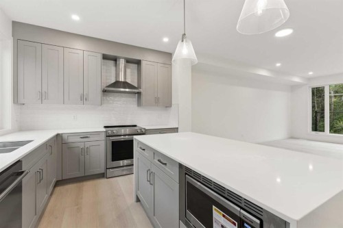 84-1453 Na'A Drive Sw, Calgary, AB - Indoor Photo Showing Kitchen With Stainless Steel Kitchen With Upgraded Kitchen