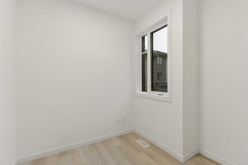 84-1453 Na'A Drive Sw, Calgary, AB - Indoor Photo Showing Other Room