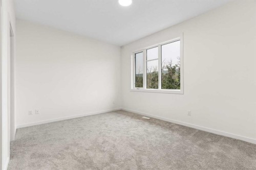 84-1453 Na'A Drive Sw, Calgary, AB - Indoor Photo Showing Other Room