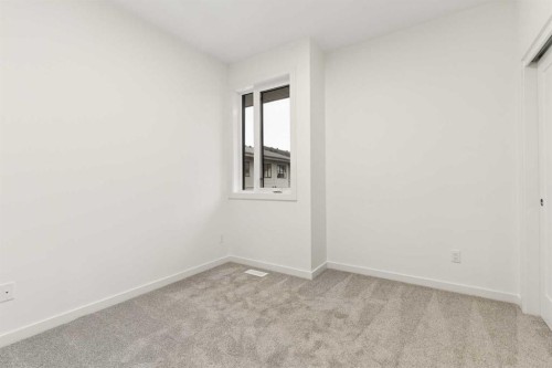 84-1453 Na'A Drive Sw, Calgary, AB - Indoor Photo Showing Other Room