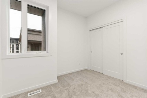84-1453 Na'A Drive Sw, Calgary, AB - Indoor Photo Showing Other Room