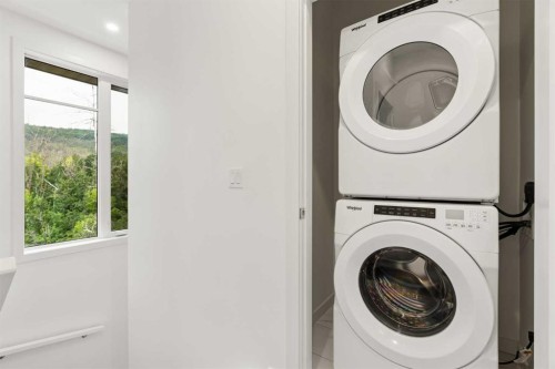 84-1453 Na'A Drive Sw, Calgary, AB - Indoor Photo Showing Laundry Room
