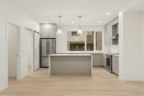 84-1453 Na'A Drive Sw, Calgary, AB - Indoor Photo Showing Kitchen With Stainless Steel Kitchen With Upgraded Kitchen