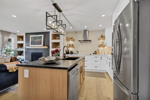 179 Capri Avenue Nw, Calgary, AB - Indoor Photo Showing Kitchen With Stainless Steel Kitchen With Upgraded Kitchen